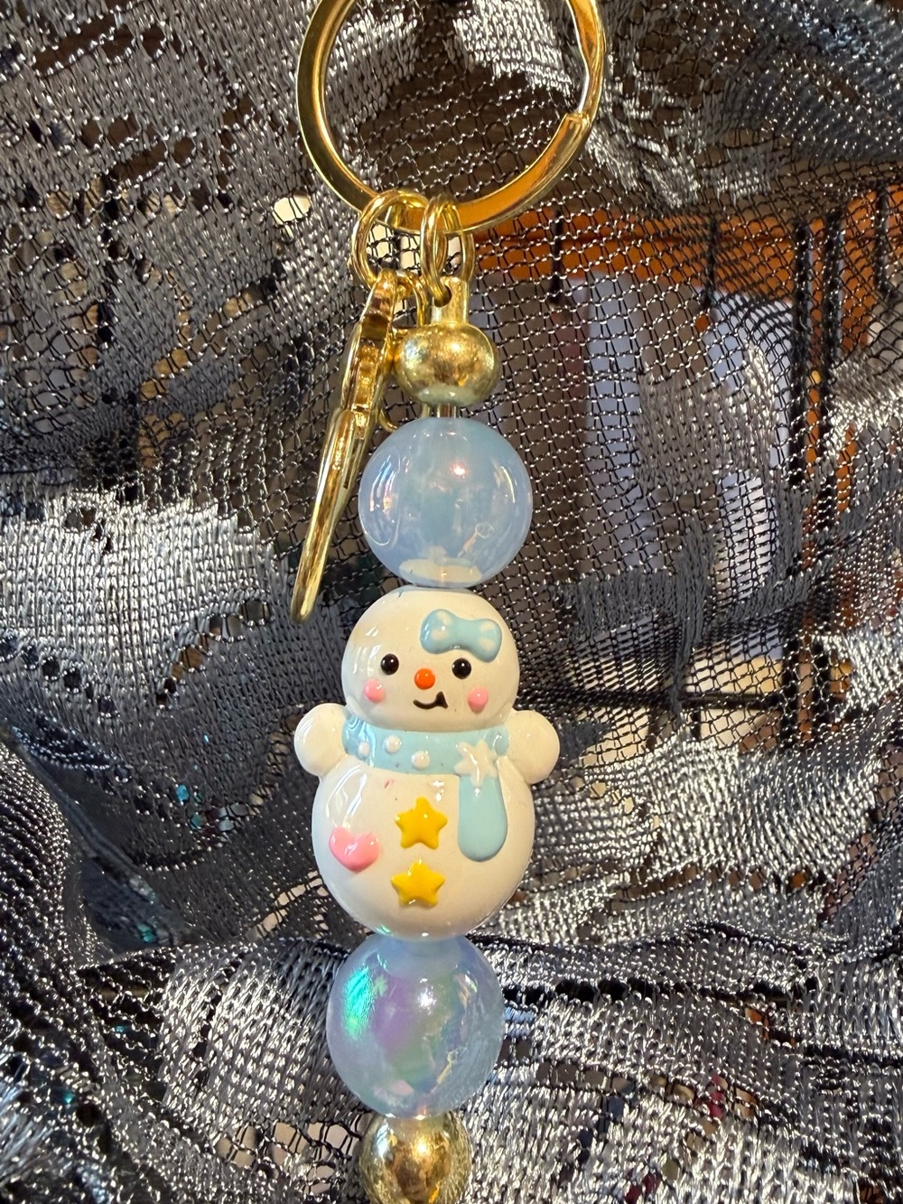Cute White Snowman Keychain with Light Blue Accents